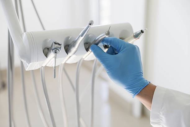 Professional Tooth Extraction technician working in Jenks, OK